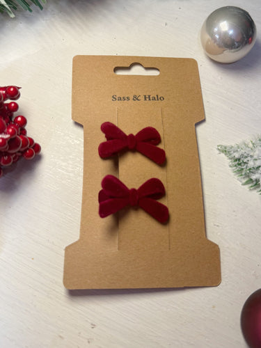 Teeny red bows